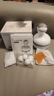 電動頭部按摩器