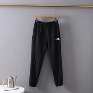 THE NORTH FACE โลโก้ปัก Beijia กางเกงกีฬาฤดูร้อนของผู้ชายกางเกงลำลองกางเกงผ้าไหมบางระบายอากาศกางเกงล