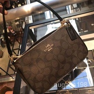 Coach top handle pouch in signature mahogany Black/women bags/shoulder bags/crossbody bags/shoulder bags ZWY8