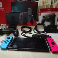 Used Nintendo Switch V2 with procon and 2 Games