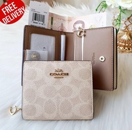 COACH กระเป๋าสตางค์ใบสั้น CW789 SNAP WALLET IN SIGNATURE CANVAS