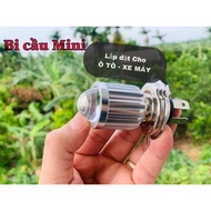 H4 2-color yellow and white ball bearing headlight mounted on motorbike