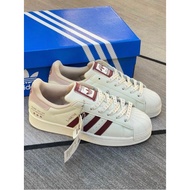 Superstar sneakers with red stars