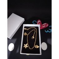 10k saudi gold bracelet w/charm flower-880