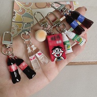 Funny keychain shaped like beer cans and coke cans