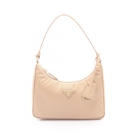[มือสอง] กระเป๋าถือ Prada รุ่น Re-Edition 2005 Re-Nylon Mini Bag รหัส 1N204XR064F0Y8C สีเบจ ทำจากไนล