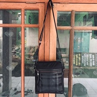 Daks sling bag leather x Canvas