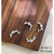 Set of 2 nail charms with star and arc nails A25