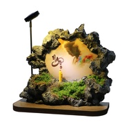 Handmade calligraphy stone with the word NGO with decorative paintings and lights as gifts