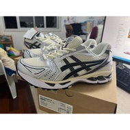 2024hot Asics เจล Kayano 14 สีเงินสีขาว Series น้ำหนักเบากันกระแทกกีฬาลำลองรองเท้าวิ่งสำหรับบุรุษและ