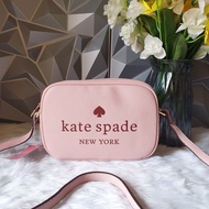 Kate Spade Mini Zip Camera Bag in Light Pink Pebble Leather Embossed with Spade Logo - Women's Sling Bag