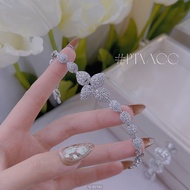 PTNACC Platinum bracelet full of 4-leaf clover