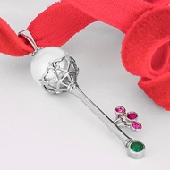 White gold key pendant with pearl, emerald and sapphires