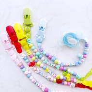 Dummy strap, plastic bead teether