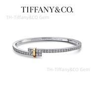 Tiffany Edge Hinged Bypass Bracelet Platinum & Yellow Gold Diamond Accents การออกแบบจี้วงกลม