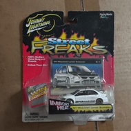 Johnny Lightning 04 Mitsubishi Lancer Evolution Street Freaks White BF goodrich