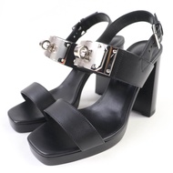 全新未使用 HERMES Ilona 銀色五金 Kelly 扣環黑色皮革涼鞋，尺寸 36.5，義大利製造，附鞋盒和防塵袋。