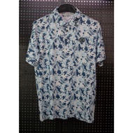G/gfore golf shirt with unique floral pattern, stretchy material with sharp embroidered logo