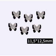 2 first-class nail charms