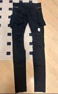 Undercover undercoverism distressed pants jeans