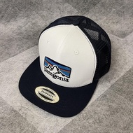 หมวกเบสบอลปีกหน้าแบนด้านบน - หมวกสไตล์ Patagonia ของผู้ชาย