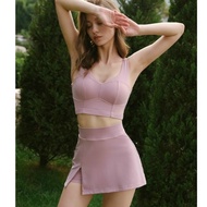 Women's sports aerobic yoga gym outfit includes bra with padding and skirtShorts with multi-colored 