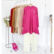 Special imported pleated top in fuchsia color