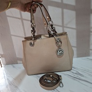 Preloved MK Baby Pink Sling Bag