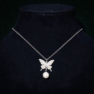 Butterfly with pearl necklace