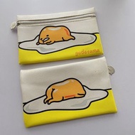 日本 Sanrio 蛋黃哥 GUDETAMA 米白色皮革 雙面圖案 耳機 收納袋