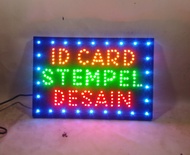 Papan lampu tulisan LED sign percetakan id card stempel desain