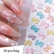 50Pcs/Bag Bowknot Resin Auroras Rose Flower Nail Charm Parts 3D White Flatback Nail Rhinestones Nail