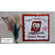 Fold-out flaps book: Happy Valentine's Day Curious George!