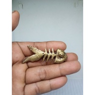 Yellow iron fish statue