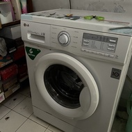 mesin cuci LG front loading 6 kg bekas