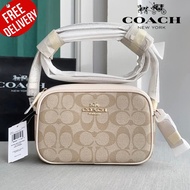 COACH กระเป๋าสะพาย CQ874 MINI JAMIE SIGNATURE CANVAS CAMERA BAG