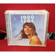 CD. TAYLOR SWIFT 1989 TAYLOR'S VERSION PLUS FHOTOS (BLUE - EDITION) CD. TAYLOR SWIFT 1989 TAYLOR'S V