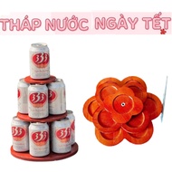 3-storey wooden tower decorated with beer and soft drinks - 3-storey water tower displaying altar on