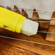 Guzheng string polishing wax