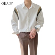 [มีสินค้าในสต๊อก] OKADY เสื้อเชิ้ตผู้ชายแฟชั่นลายทางสไตล์เกาหลีเชิ้ตแขนยาวหลวมสบาย ๆ ด้านบนเย็บประกบ