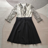 Forwarding A Black And White Dress 37-31-F Right Length 39 Left 41