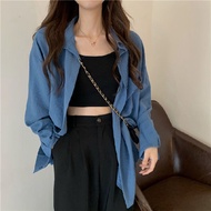 Autumn women wear a blouse over a solid color