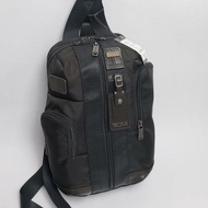Tumi Higgins sling bag crossbody Backpack. Black.