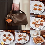 IRTJIFSSX Simulated Food Keychain, Alkaline Water Hand Croissant Model Bread Key Ring, Novelty Simul