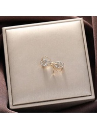 合金和鑽石裝飾女性服裝的襟針,蝴蝶結造型