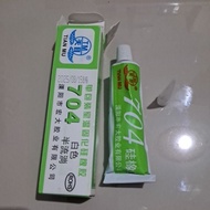 Adhesive glue 704