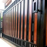 pintu dorong minimalis + GRC motif serat kayu