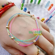 Lucky us10k gold and 71 string jewelry bracelet