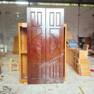 pintu utama rumah kayu jati pintu kupu tarung ukiran mebel Jepara
