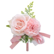 Forest-style orange and orange-toned flowers, forest-style leaves, groom's wedding boutonniere, brid